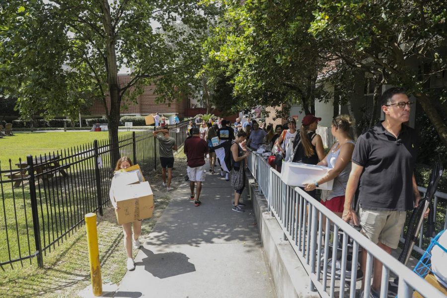 Students move into Buddig hall during move in on Thursday Aug. 15, 2019. The university is offering an opportunity to allow students to move onto campus with a delayed move-in date this semester. 