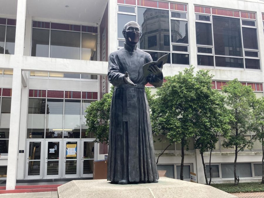 St. Ignatious statue showing how students can care for one another while on campus