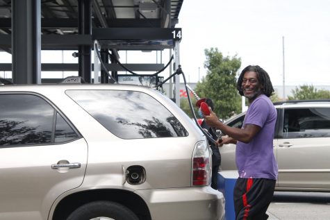 New Orleans resident pumps gas at Costco Sept. 14 ahead of Hurricane Sally. The Hurricane, which was recently upgraded to a Category 2 storm, is expected to hit the Gulf coast late Sept. 14 Photo credit: Jaime Jimenez