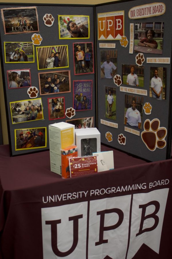 Various prizes sit on table for students who win UPB jeopardy.