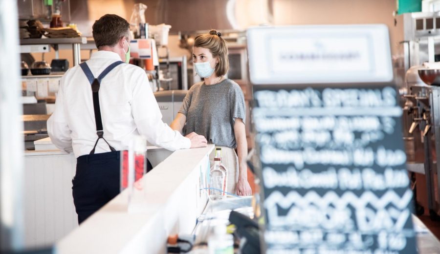 Sara Brennan stands behind the counter at The Commissary, a Dickie Brennan and Co. central kitchen, market, and restaurant on September 5. Opened in April of 2020, the staff of The Commissary quickly encountered unprecedented challenges in the restaurant industry. Photo credit: Michael Bauer