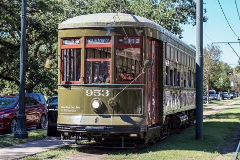 A streetcar heads down St. Charles Ave on October 23, 2019. The streetcar is a common symbol of New Orleans. Photo credit: Cristian Orellana