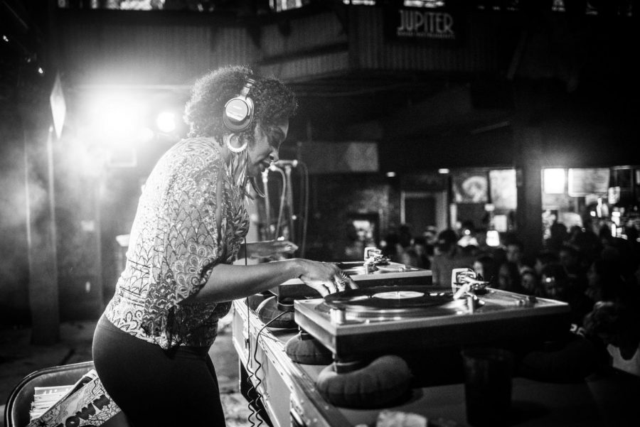 DJ Soul Sister, known for her music mixing abilities, is pictured playing a set pre-pandemic. DJ Soul Sister, also known as Melissa A. Weber, joined Loyola faculty this semester. Courtesy of Melissa A. Weber.