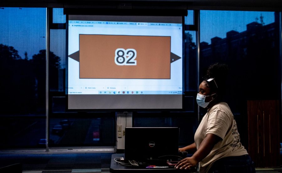 Finance and marketing major and BSU Vice President Carrie Elizabeth Smith is working at the BSU Halloween Bingo. This is one of many events BSU will be hosting this year to engage with the Loyola community. Photo credit: Kylie Evans