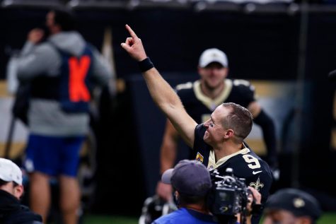 New Orleans Saints quarterback Drew Brees reacts after defeating the Los Angeles Chargers in overtime of an NFL football game in New Orleans, Monday, Oct. 12, 2020. The Saints won 30-27. (AP Photo/Butch Dill
