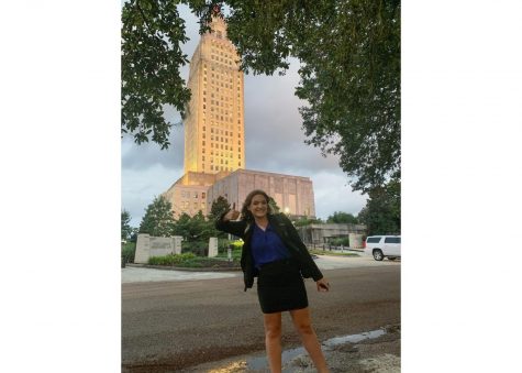 Alexis Horton poses in front of the Louisiana State Senate. She started working there at the start of the pandemic. Courtesy of Alexis Horton.