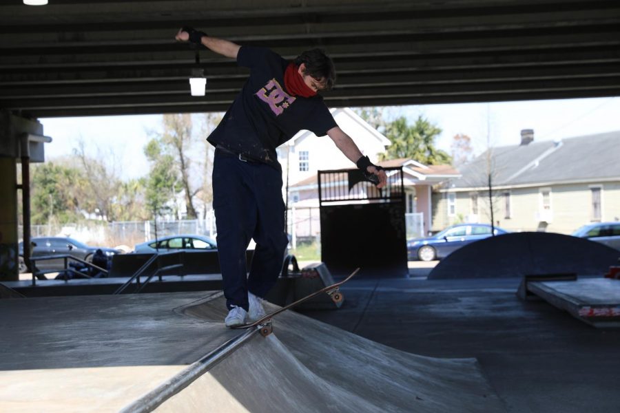 A skateboarder prepares to skate down a ramp at Parisite DIY Skatepark. Skateboarders have many options to build their skating skills at places like this.