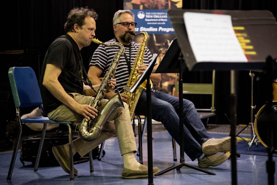 Jazz faculty member Jason Mingledorff, left. and Brent Rose rehearse with the New Orleans Nightcrawlers. The group recently won a Grammy in the new category of Best Regional Roots Album. Photo credit: Michael Bauer