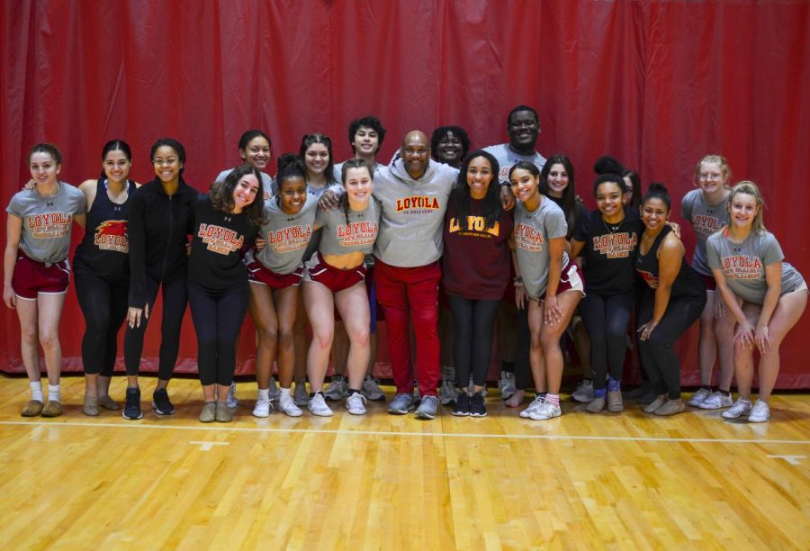 Rickey Hill with members of the 2019-2020 cheer and dance teams.