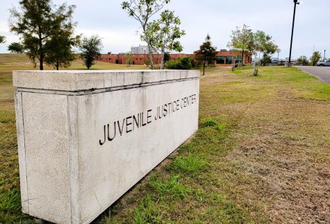 The sign for the Juvenile Justice Center sits along the drive to its entrance in New Orleans, LA on Nov. 4, 2021. The Juvenile Justice Center evacuated 36 juveniles to an adult center during Hurricane Ida.