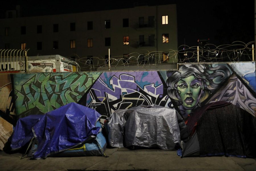 Tents line San Julian Street in the skid row area of Los Angeles before dawn on February 2, 2018. Homelessness has impacted teenagers in New Orleans and across the country.