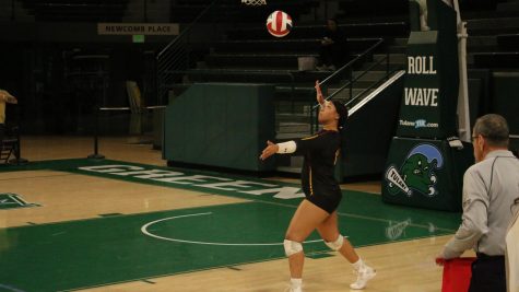 Dallis Brown serves for the Pack at the womens volleyball game against William Carey University in temporary host Tulane Universitys Devlin Fieldhouse on Tuesday, Nov. 2, 2021.