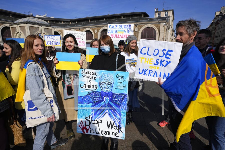 A+group+of+Ukrainian+protesters+demonstrate+near+the+Chateau+de+Versailles%2C+where+a+European+Union+summit+will+take+place%2C+Thursday%2C+March+10%2C+2022+in+Versailles%2C+west+of+Paris.+With+European+nations+united+in+backing+Ukraines+resistance+with+unprecedented+economic+sanctions%2C+three+main+topics+now+dominate+the+agenda%3A+Ukraines+application+for+fast-track+EU+membership%3B+how+to+wean+the+bloc+off+its+Russian+energy+dependency%3B+and+bolstering+the+regions+defense+capabilities.+%28AP+Photo%2FMichel+Euler%29