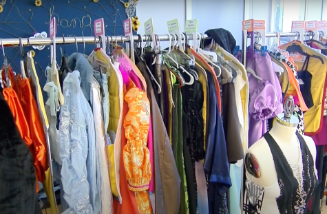 A rack filled with costumes sits in the Loyola costume shop on the 6th floor of Monroe Hall. Kaci Thomassie and Roger Bouche designed the costumes for Loyolas first musical back in two years. 