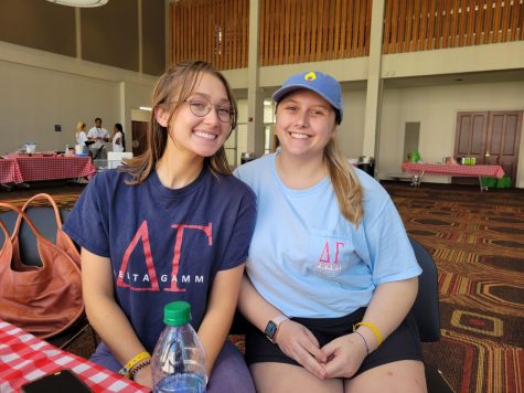 Whitney McBay (right), former Dance Marathon president, sits beside her sorority sister and Delta Gamma president, Margaret Whitten (left), at Loyolas Dance Marathon on Saturday, April 2 in the Orleans Room of the Danna Center. Delta Gamma is one of the biggest fundrasiers for Dance Marathon, an event meant to benefit New Orleans Childrens Hospital.