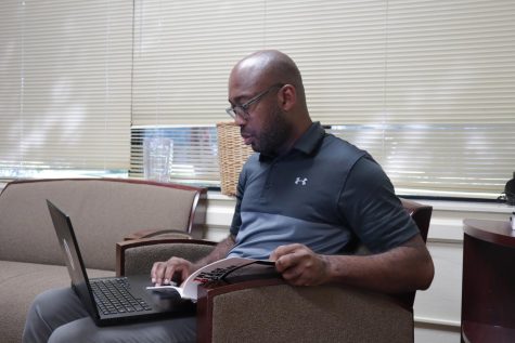 Dr. Kedrick Perry works in the Diversity, Equity, and Inclusion Office in Bobet Hall on Sep. 14, 2022.