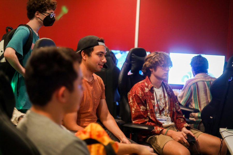 A+group+of+students+sit+in+the+new+esports+facility+playing+video+games