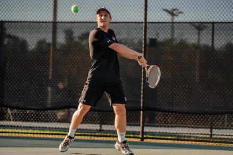Tennis player hits a backhand at XULA Tennis Center