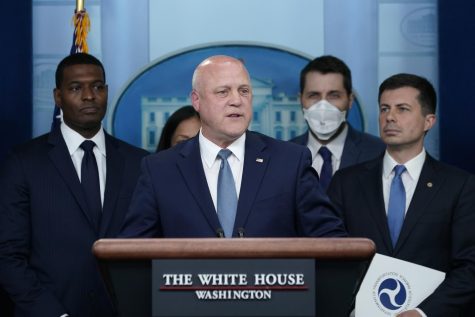 White House infrastructure coordinator Mitch Landrieu, center, speaks during a briefing at the White House in Washington, on May 16, 2022, on the six-month anniversary of the bipartisan infrastructure law. He is joined by, from left, Environmental Protection Agency administrator Michael Regan, National Economic Council director Brian Deese, and Transportation Secretary Pete Buttigieg. The White House will host a summit Thursday, Oct. 13 to help speed up construction projects tied to the roughly $1 trillion infrastructure law — an effort to improve coordination with the mayors and governors who directly account for 90% of the spending. 