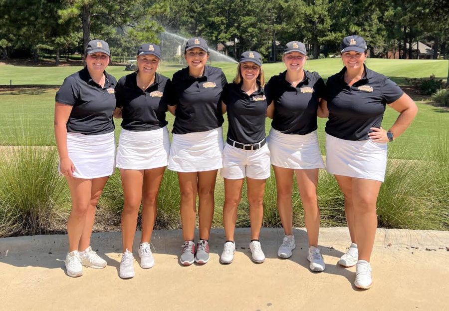 The womens golf team poses as a group at the Innisbrrok Invitational in Palm Harbor, Florida.