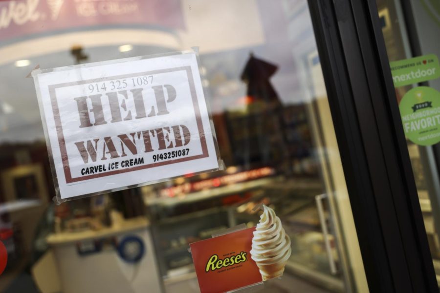 A help wanted sign in a storefront, Tuesday, Nov. 1, 2022, in Bedford, N.Y. The Federal Reserve may reach a turning point this week as it announces whats expected to be another substantial three-quarter-point hike in its key interest rate. The Feds hikes have already led to much costlier borrowing rates, ranging from mortgages to auto and business loans. 