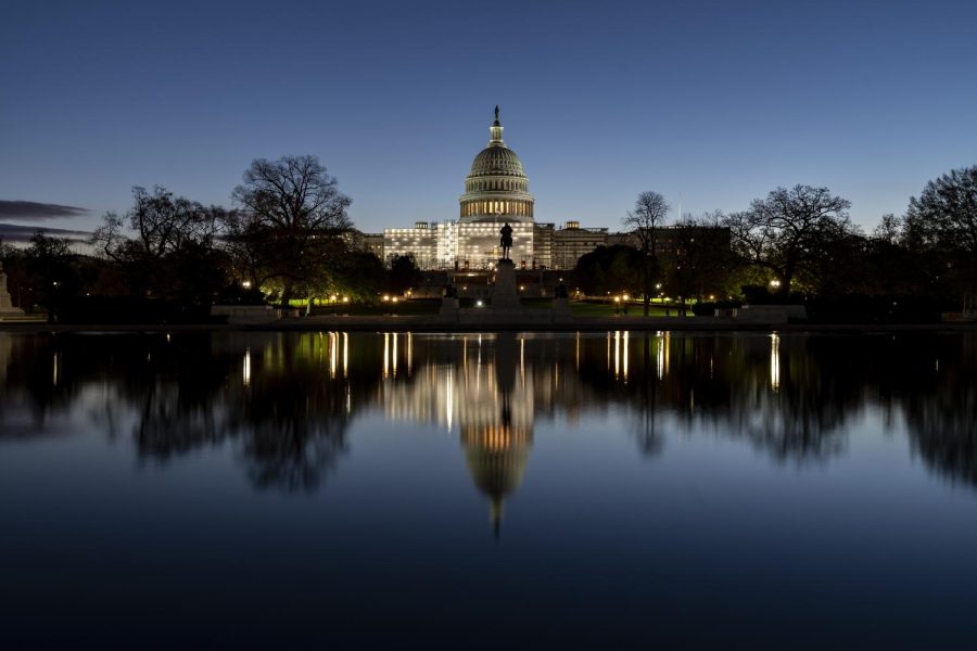 The Capitol is seen as Congress resumes following a long break and the midterm elections, in Washington, early Monday, Nov. 14, 2022. Presidential candidates for the 2024 election year are campaigning to boost polling numbers. 