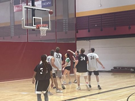 The Loyola faculty and students play an exhibition basketball game for Loyola Week. The Jesuits won by two points. 
