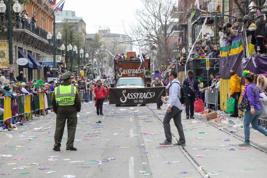 The+SassyRacs+Krewe+rolls+during+the+Tucks+parade+on+Feb.+26+as+a+police+officer+guards+the+street.+Parades+like+Tucks+will+have+to+decrease+the+length+of+their+routes+due+to+a+lack+of+police+presence.