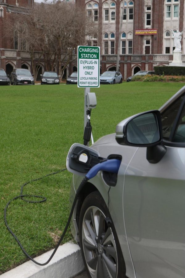 A photo of an electric car being charged.