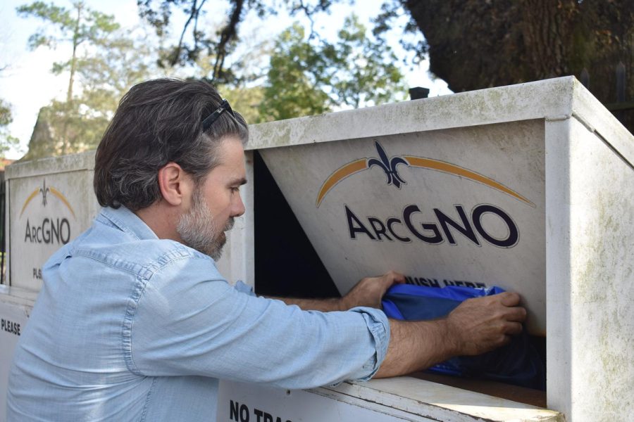 Man dumping beads into an ArcGNO bin.
