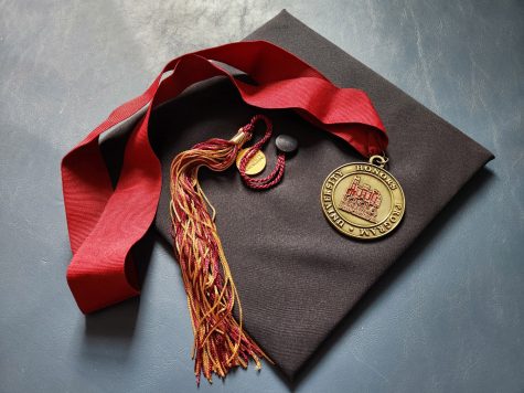 A honors medal that is given to students who successfully graduate from the University and stay in the program.