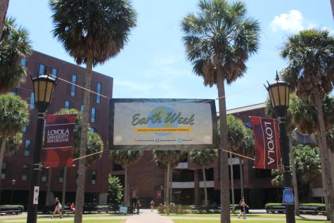 Loyola reminds students of the Earth Week celebration by hanging a banner between two light poles on campus promoting sustainability and environmentalism . The banner serves as a reminder to prioritize the health of our planet and take action towards a greener future.