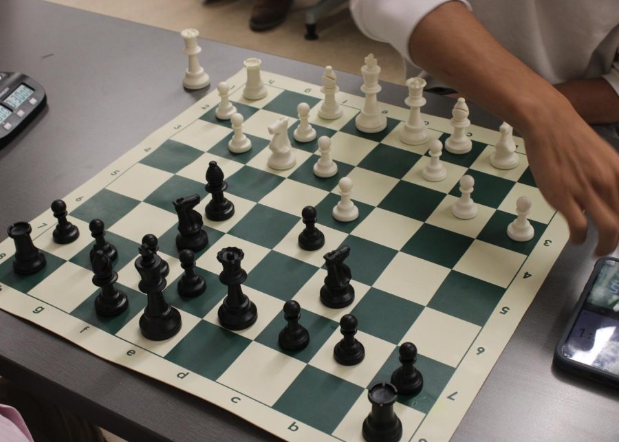 Members of Loyola's chess club play a game at their first tournament since the COVID-19 pandemic.