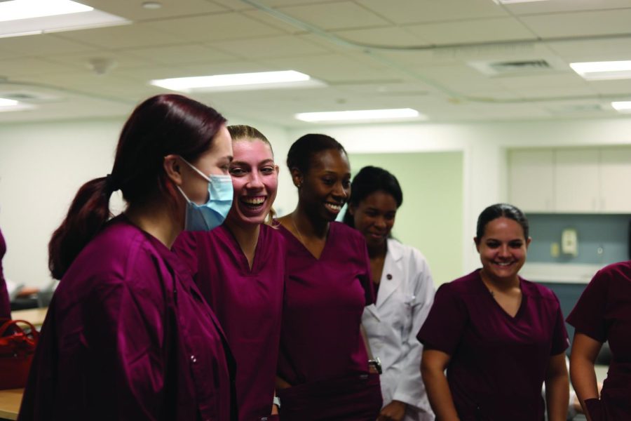 Nursing+students+observe+a+demonstration+for+class+on+Aug.+25%2C+2022.+The+nursing+program+at+Loyola+has+continued+to+grow.