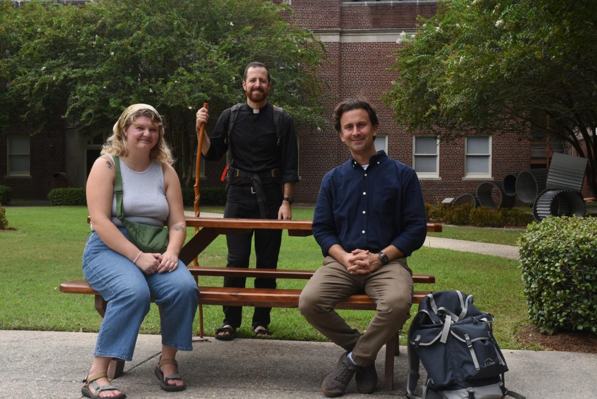 Josh Hinchie with resident minister Sarah Mernaugh and professor Kevin Rabalais to promote his abroad J-Term course this year. J-Term courses are both abroad and online and offer students the chance to gain three credit hours in two weeks.