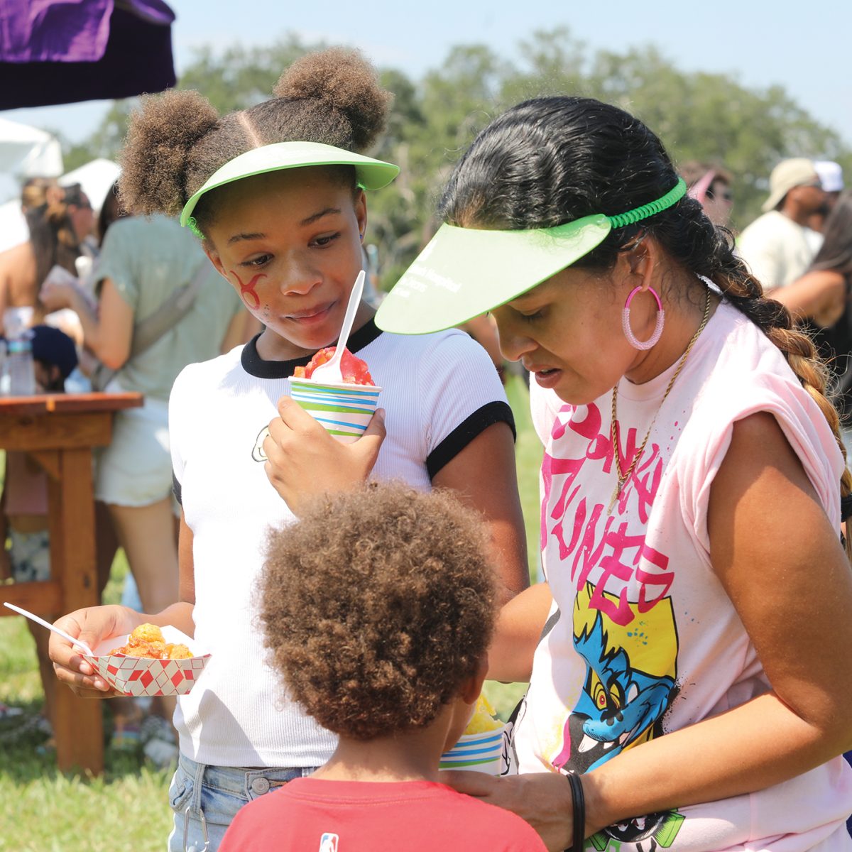 Beignet+Fest+attendees+enjoys+festival+eats+on+Saturday%2C+Sept.+23.+A+fully+activated+and+sensory+friendly+Kids+Village+created+by+Children%E2%80%99s+Hospital+New+Orleans+offered+a+one-of-a-kind+experience+for+all+children.