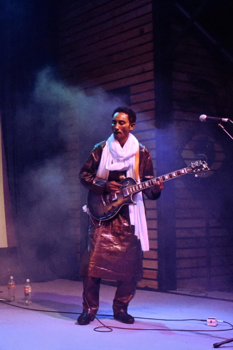 Rhythm guitarist Kawissan Mohamed performs at The Broadside on Sept. 15, 2023. The band is on their Peace and Love tour, which is traveling through the U.S. and Europe.