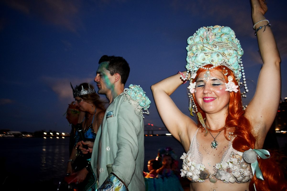 Krewe du Fools mermaids, mermen, and musicians march along the French Quarter riverfront on Sept. 2. The krewe raised funds for the Audubon Nature Institutes education department and newly opened aquarium.