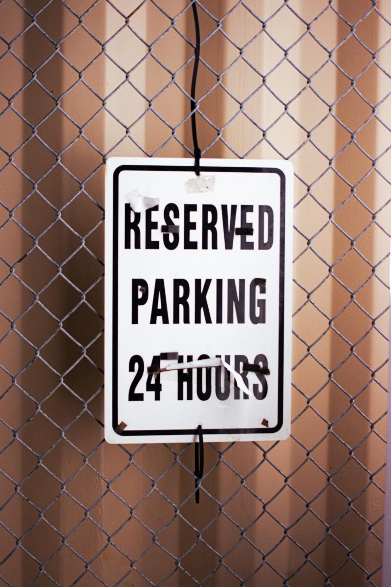 Reserved+parking+sign+in+one+parking+garage+on+campus.+Students+have+struggled+to+find+parking+on+campus+this+semester.