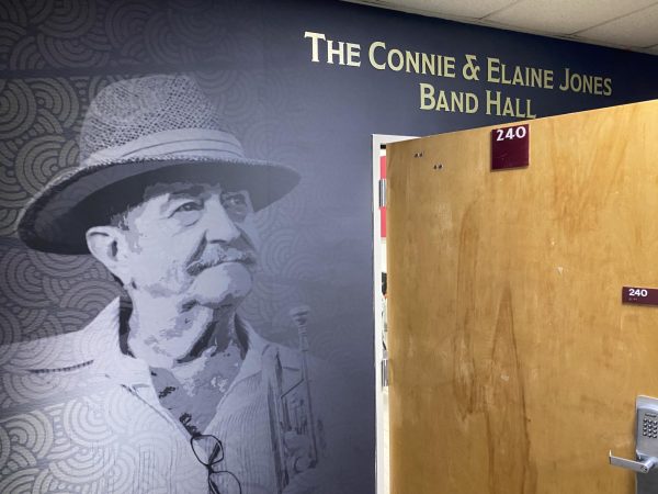 Mural of Connie Jones outside of renovated band hall, made possible by Jones endowment. A concert honoring his memory will be held in Nunemaker Auditorium on Sept. 19, 2023. 