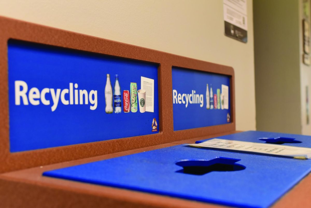 Two+side+by+side+recycling+bins+depicting+recyclable+materials+on+Loyolas+campus+on+Jan.+19%2C+2024.