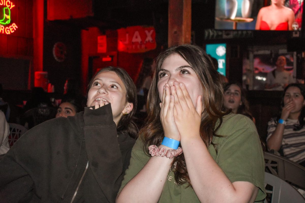 Students react to Bachelor Joey Graziadeis proposal to Kelsey Anderson at The Boot on March 25, 2024.