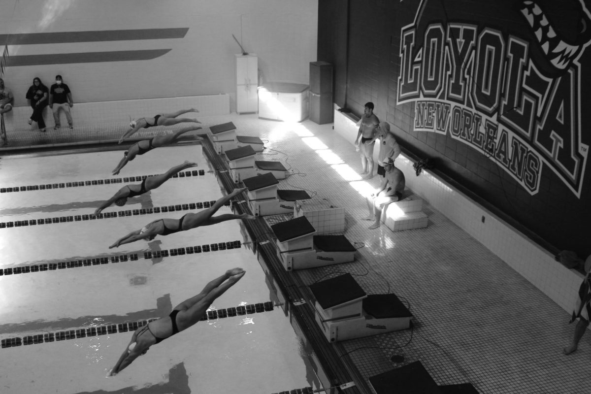 Members+of+Loyola+swim+team+race+in+the+indoor+pool+on+Jan.+20%2C+2023.+The+team+concluded+their+season+at+nationals+in+Columbus%2C+GA.+