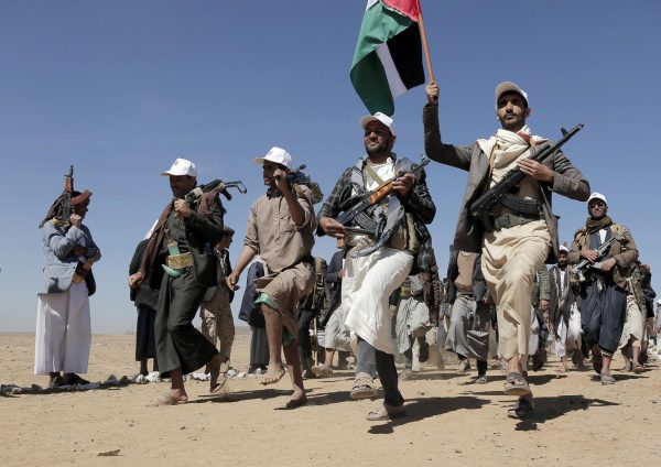 Houthi fighters march during a rally of support for the Palestinians in the Gaza Strip and against the U.S. strikes on Yemen outside Sanaa on Jan. 22, 2024.