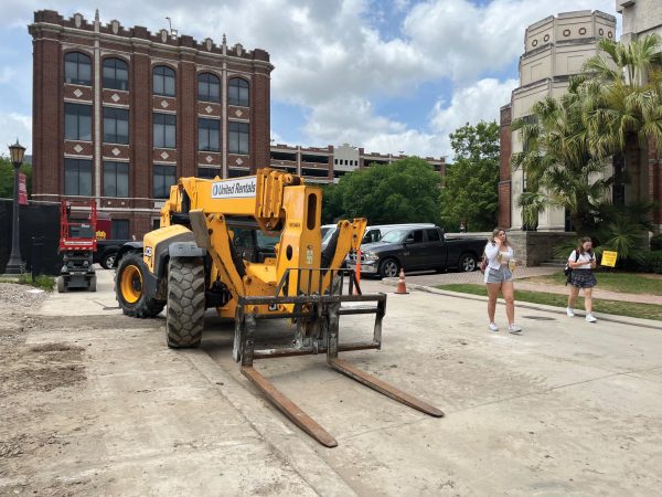 A piece of construction equipment sits in front of the chapel construction. Students have experienced catcalling from the workers. 