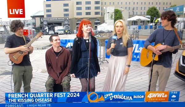 The Kissing Disease speaks with 4WWLs Brheanna Berry after a French Quarter Fest performance teaser on April 11, 2024. Screenshot of live broadcast.