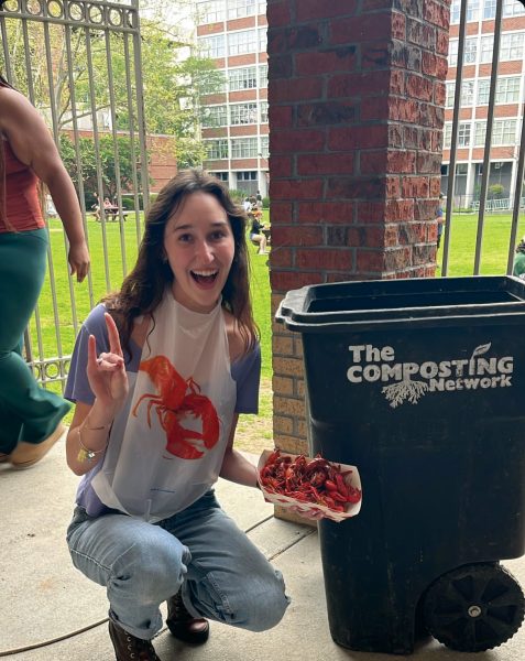 Rowan Sawyer poses with a crawfish composting bin at “Crawfish in the Quad” on March 15, 2024. Courtesy of Rowan Sawyer