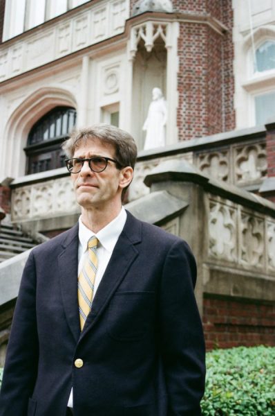 Leonard Kahn, philosophy and ethics professor, poses in front of Loyola University. Sofia Santoro/ The Maroon Archives