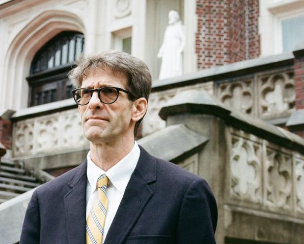 Leonard Kahn, philosophy and ethics professor, poses in front of Loyola University. Sofia Santoro/ The Maroon Archives