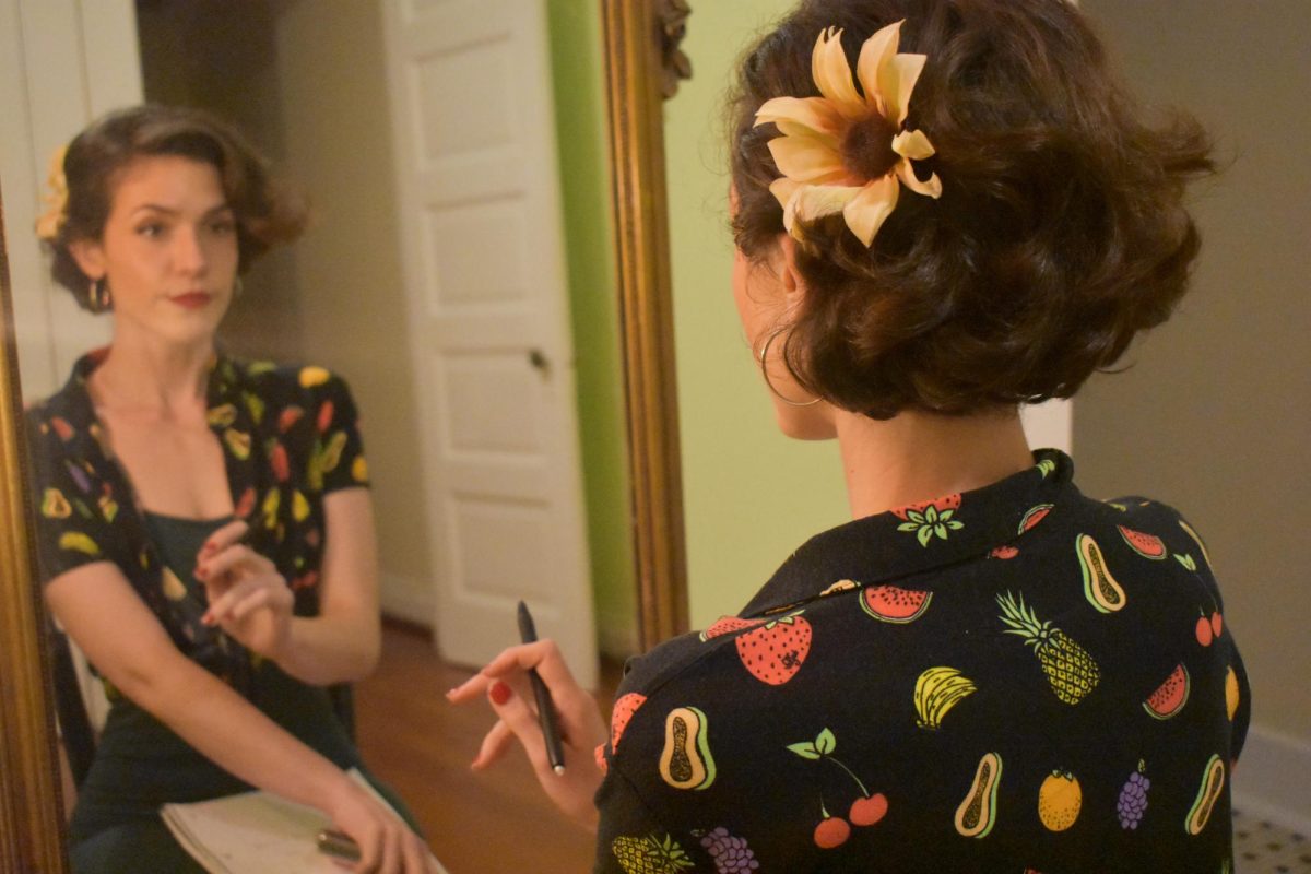 Screenwriter and actor Tracy Camp looks at her reflection in a mirror. Camps film Dont was featured in Loyolas Crescent City Film Festival on April 19-21, 2024.